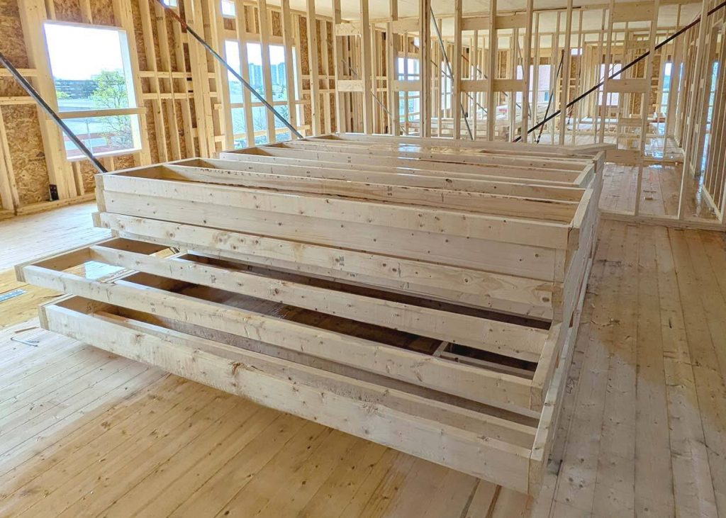 Pre-framed light wood frame assemblies